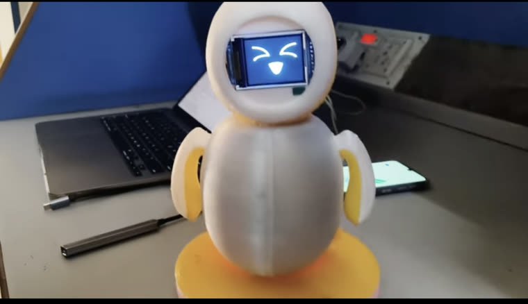 Niya, a 3D-printed desk companion showing an animated face on a small colour display